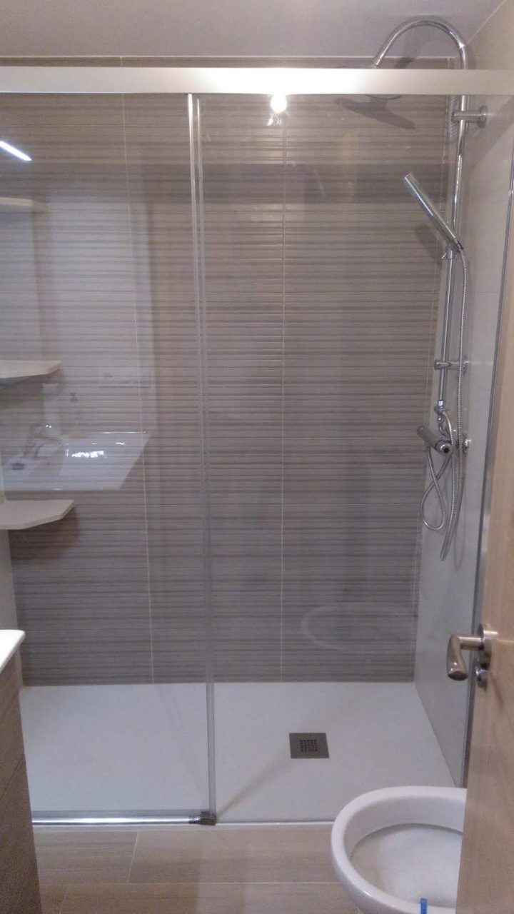 Refurbished bathroom with a walk-in tiled shower