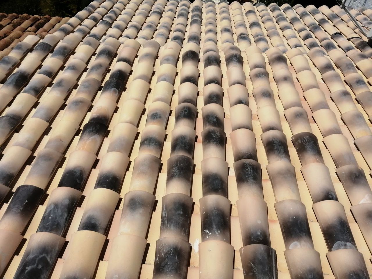 Laying tiles on a pitched roof