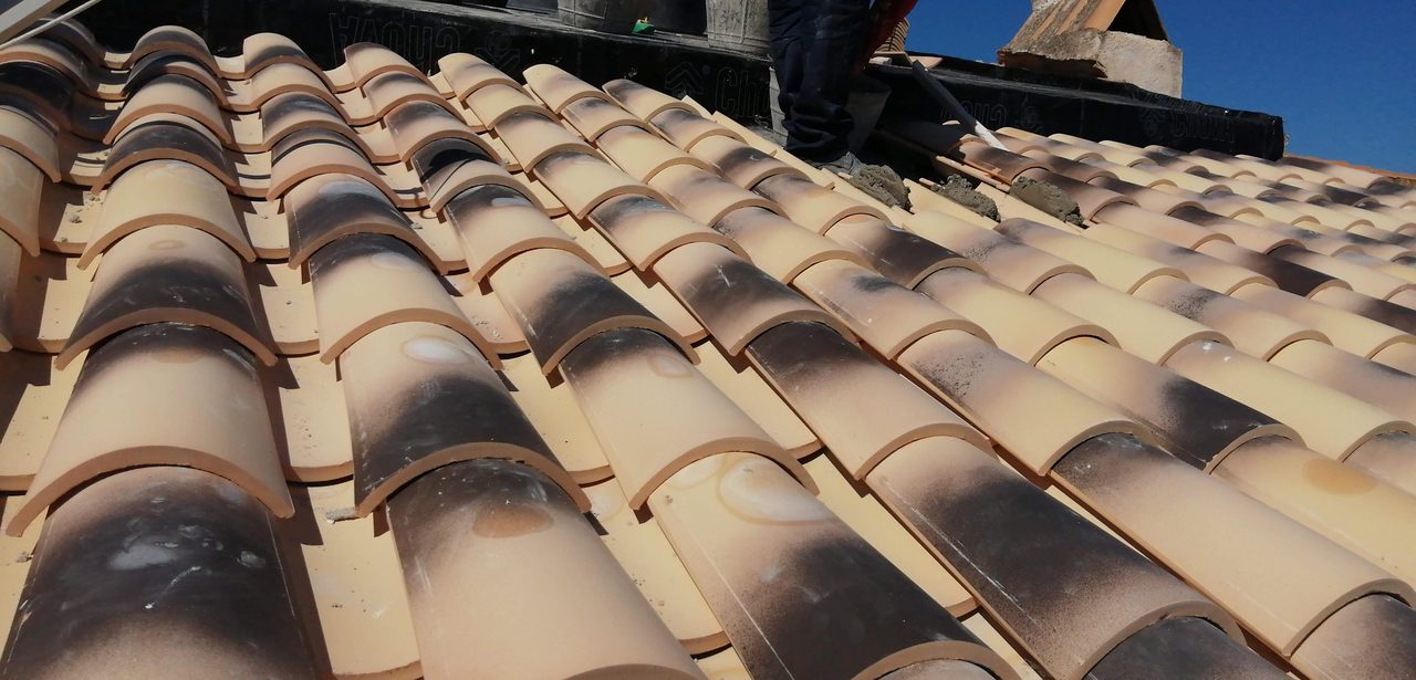 Building a pitched roof and laying the roof tiles